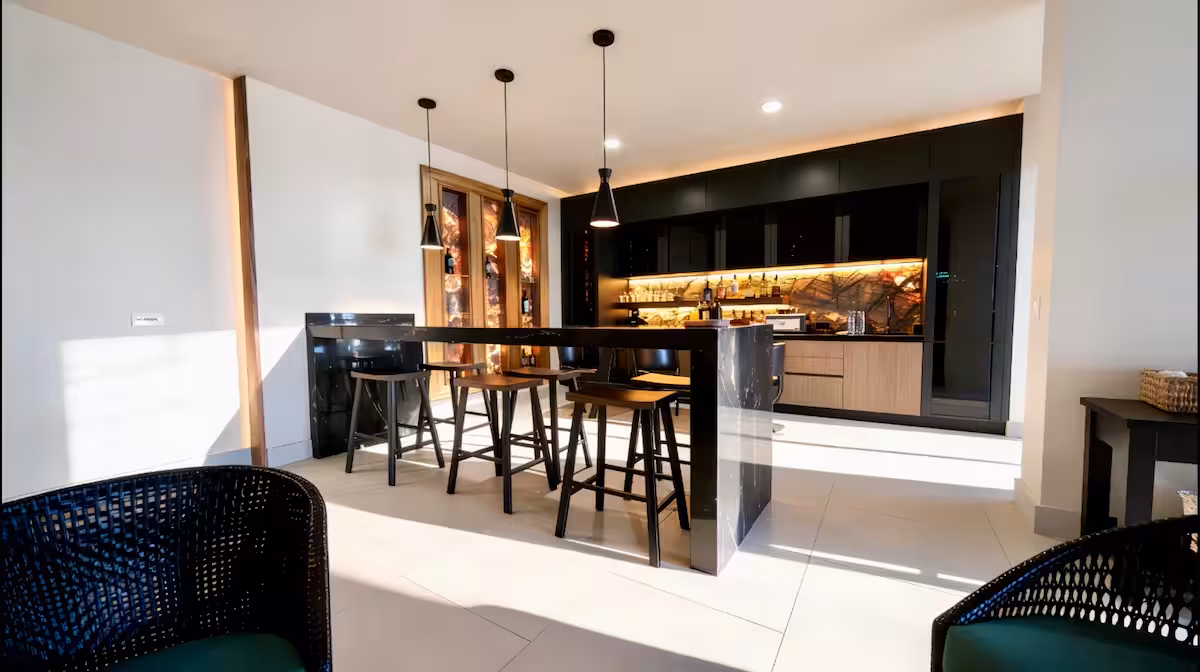 Contemporary gourmet kitchen with large island and premium finishes in a Costa Rica luxury villa