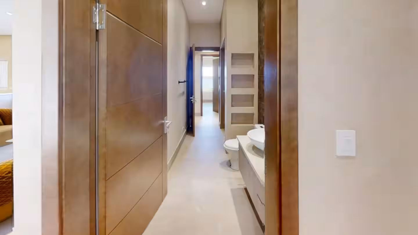 Modern guest bathroom with walk-in shower in a family vacation villa in Costa Rica
