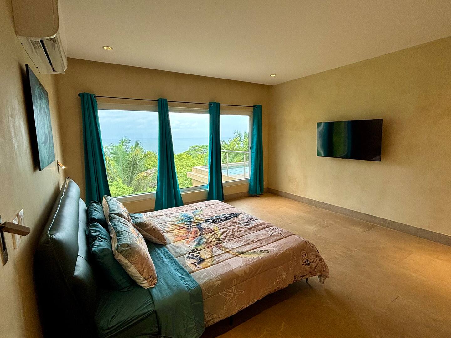 Ocean view king bedroom in a Costa Rica family vacation villa