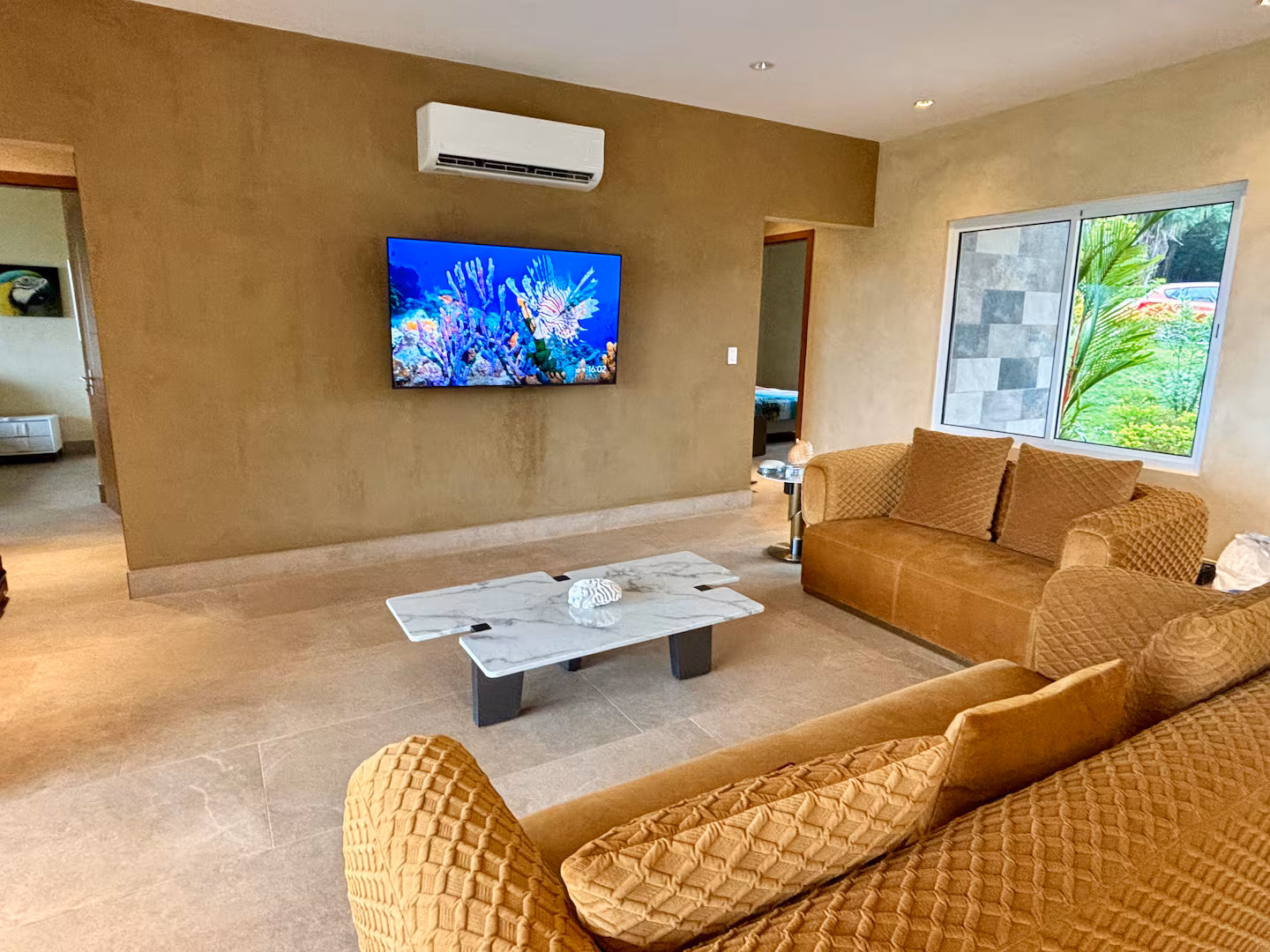 Comfortable family living room with television and spacious seating area in a Costa Rica vacation villa